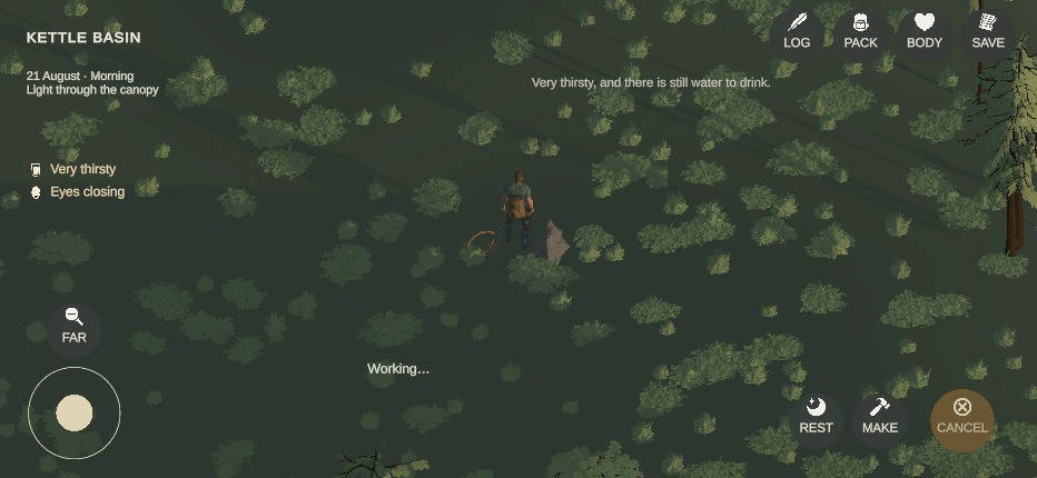 The survivor working beside the snare and the caught rabbit