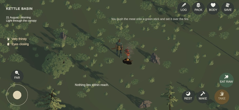 The survivor beside a small fire with the skewer over it
